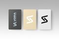 Three rectangular cards with different VORA logos on a gray background.